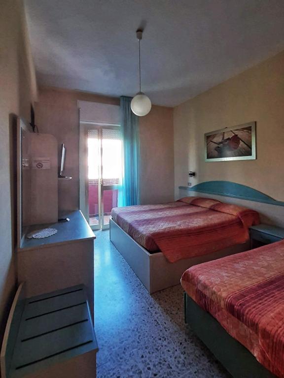 Postel nebo postele na pokoji v ubytování Hotel Prestigio