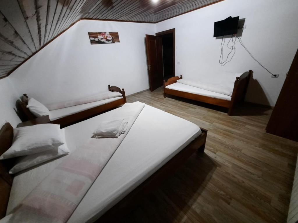 Postel nebo postele na pokoji v ubytování Vila Aloman