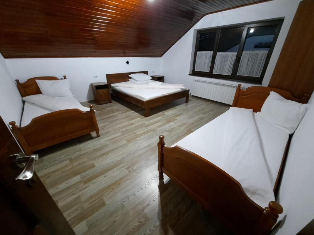 Postel nebo postele na pokoji v ubytování Vila Aloman