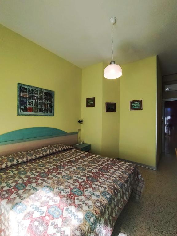 Postel nebo postele na pokoji v ubytování Hotel Prestigio