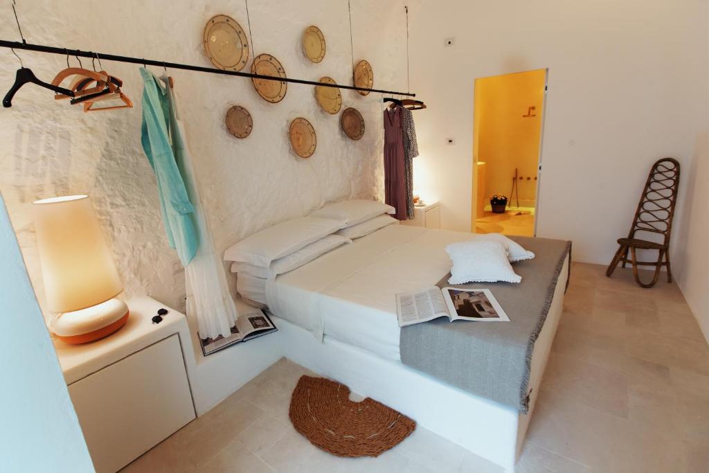 A bed or beds in a room at Corte Manfredi
