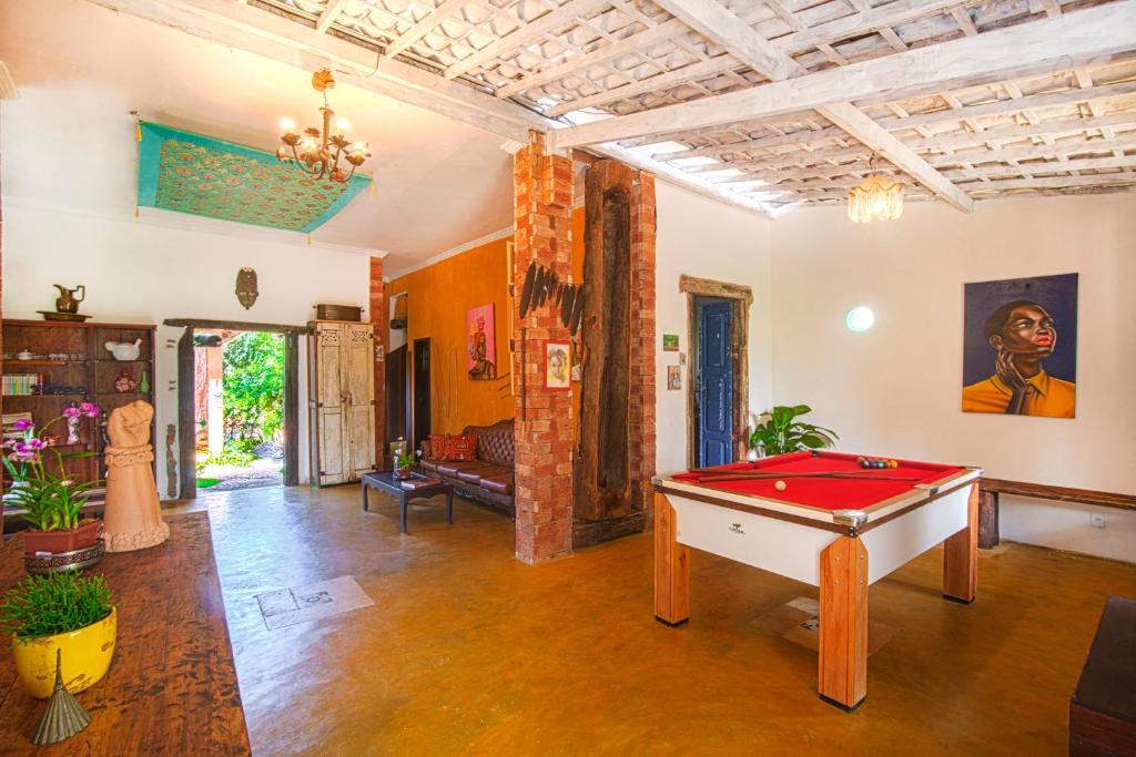 a room with a pool table in it at hostel Mama Africa 2 in Gamboa