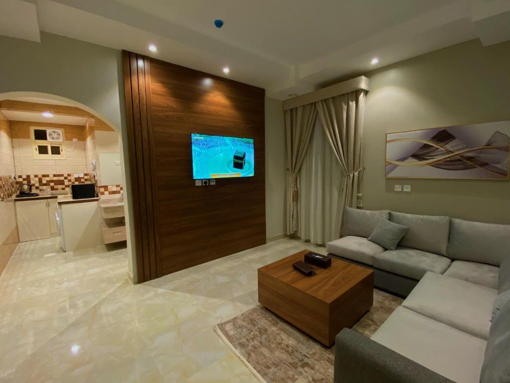 TV a/nebo společenská místnost v ubytování Quartz Executive Hotel