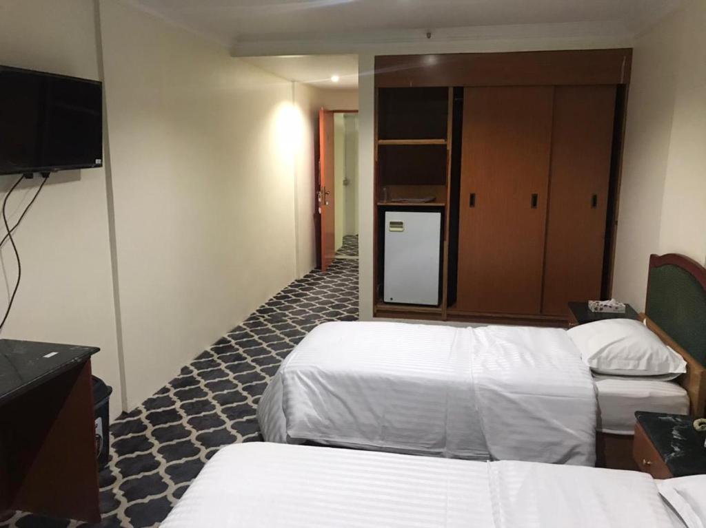 Al Aziziyah Hotel and suites - Economy Twin Room