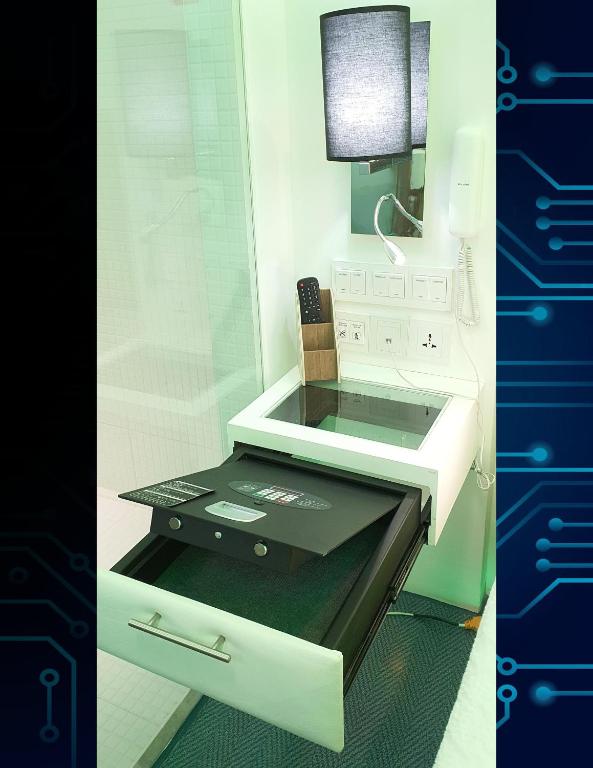 Kuchyň nebo kuchyňský kout v ubytování iOtel Luxury Kiosk Hotel