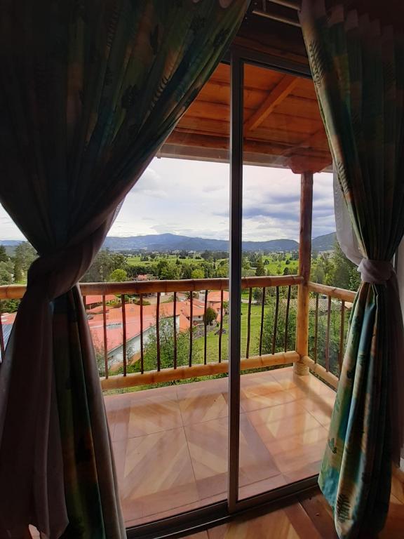 Balkón nebo terasa v ubytování Hotel Campestre Inaoska Ecospa