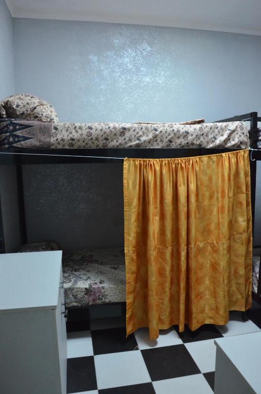 Postel nebo postele na pokoji v ubytování Hostel California
