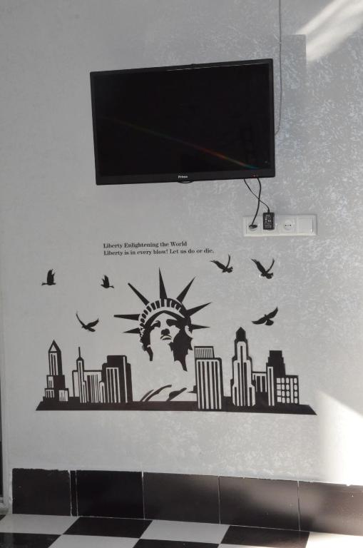 TV a/nebo společenská místnost v ubytování Hostel California