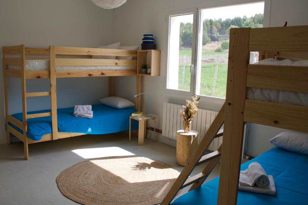 Postel nebo postele na pokoji v ubytování Entheos