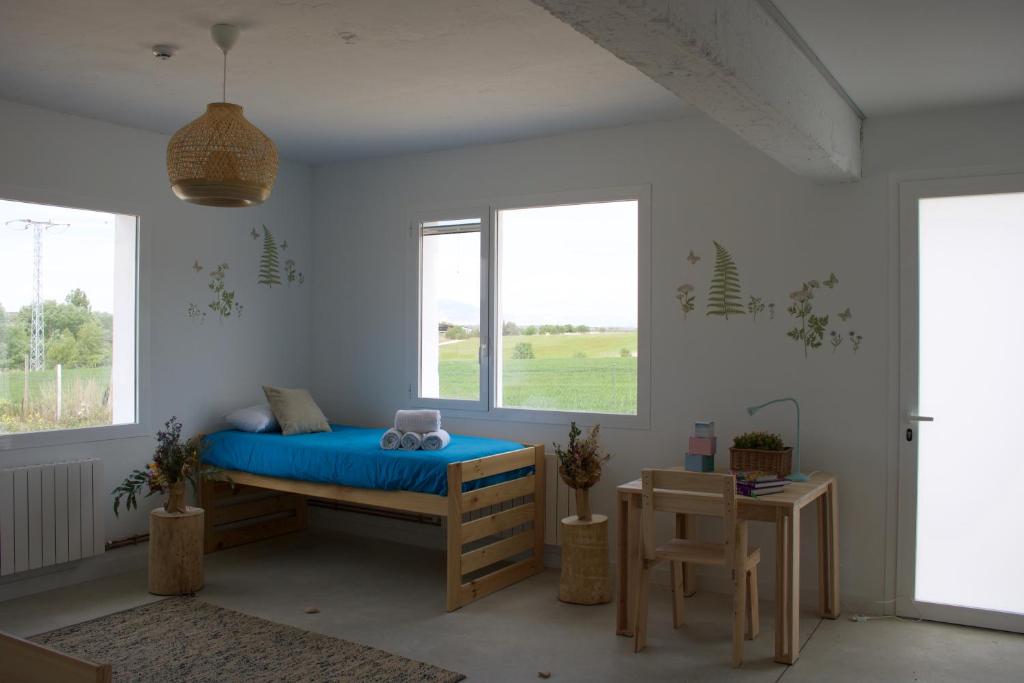 Postel nebo postele na pokoji v ubytování Entheos