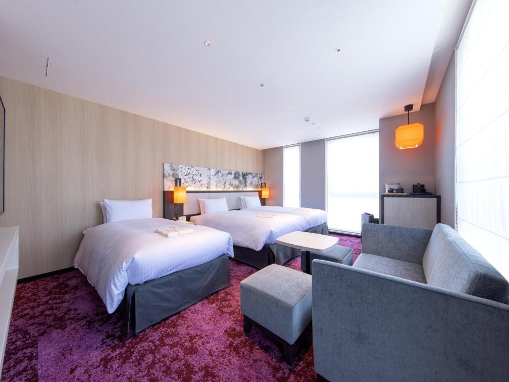 Postel nebo postele na pokoji v ubytování Hotel Forza Kyoto Shijo Kawaramachi
