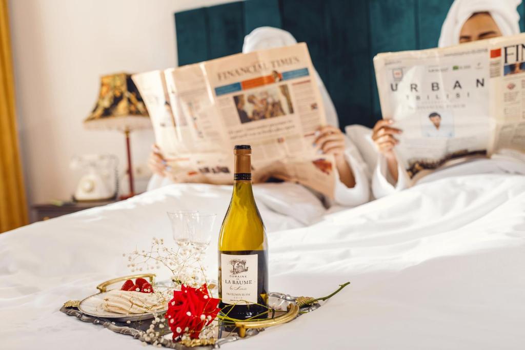 Postel nebo postele na pokoji v ubytování Octava Boutique Hotel