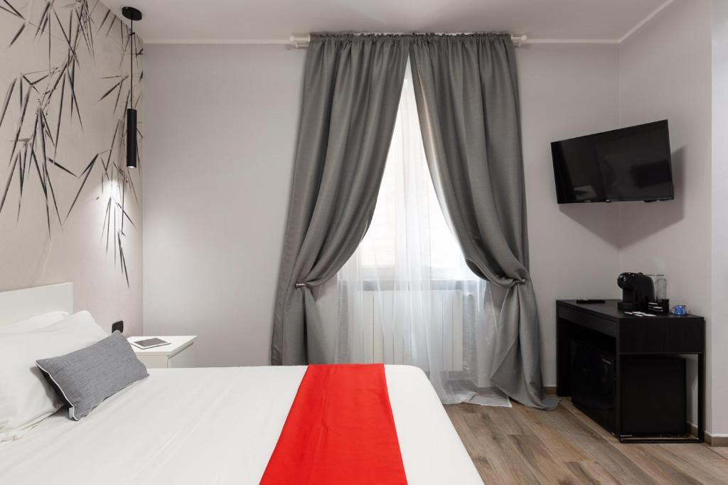 Posteľ alebo postele v izbe v ubytovaní A CASA DEI NONNI