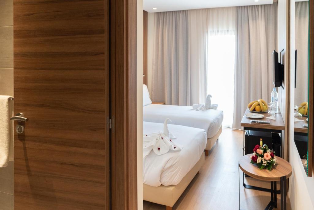Postel nebo postele na pokoji v ubytování Imperial Boutique Hotel Rabat