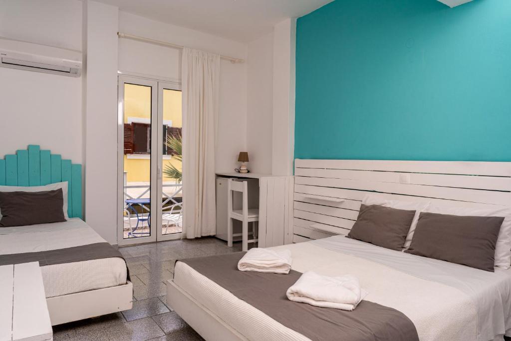 Letto o letti in una camera di Ikaros