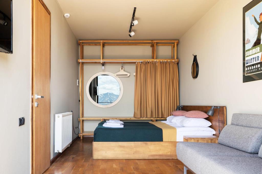 Postel nebo postele na pokoji v ubytování Quadrum Hotel