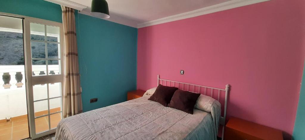 Posteľ alebo postele v izbe v ubytovaní Moclinejo House