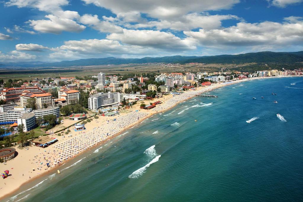 an aerial view of a beach with a crowd of people at Apartment Comfort in Sunny Beach