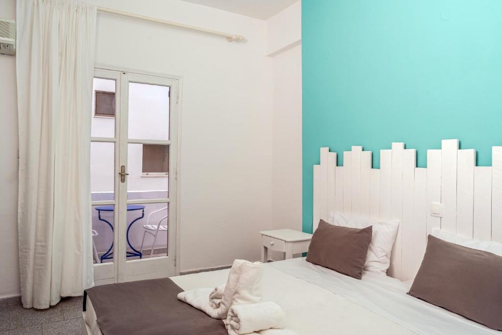 Letto o letti in una camera di Ikaros