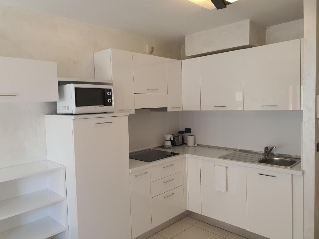Kuchyňa alebo kuchynka v ubytovaní Aparthotel Capitol
