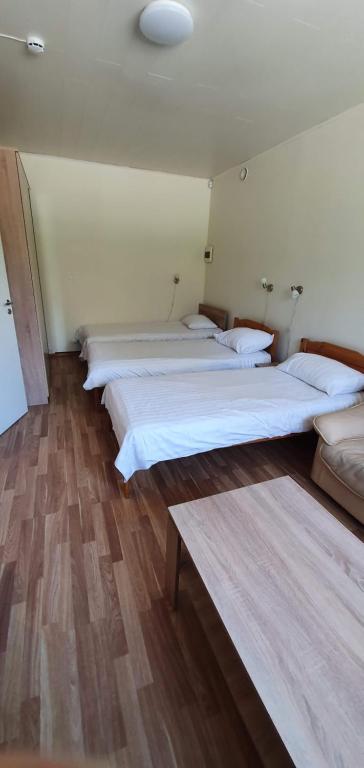 Postel nebo postele na pokoji v ubytování Männiku JK