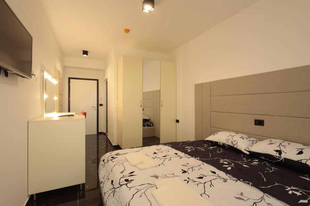 Postel nebo postele na pokoji v ubytování HOTEL EMA