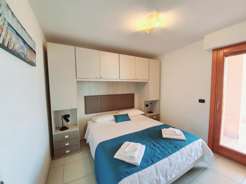 Posteľ alebo postele v izbe v ubytovaní Aparthotel Capitol