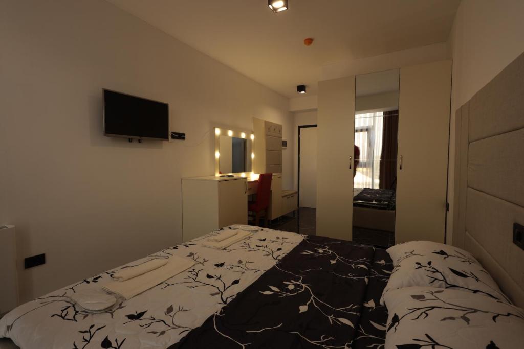 Postel nebo postele na pokoji v ubytování HOTEL EMA