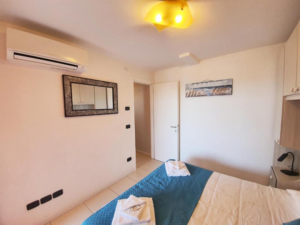 Posteľ alebo postele v izbe v ubytovaní Aparthotel Capitol