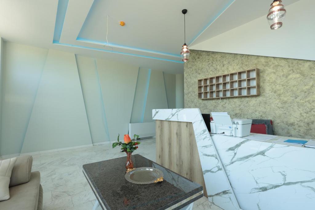 Postel nebo postele na pokoji v ubytování HOTEL EMA