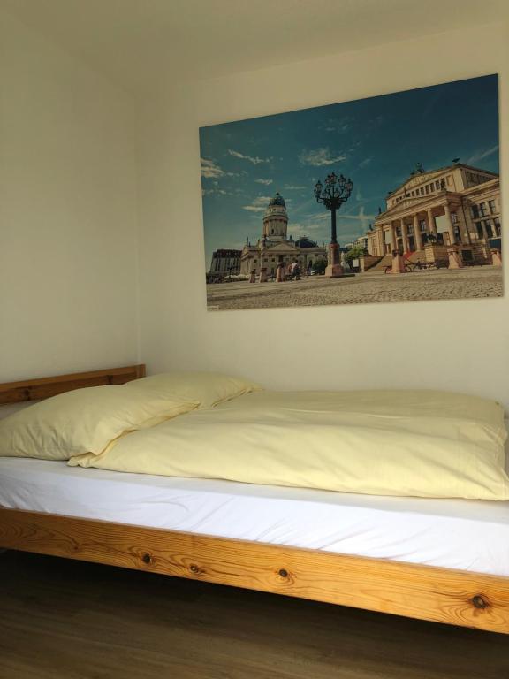 Postel nebo postele na pokoji v ubytování CLUB Lodges Berlin Mitte