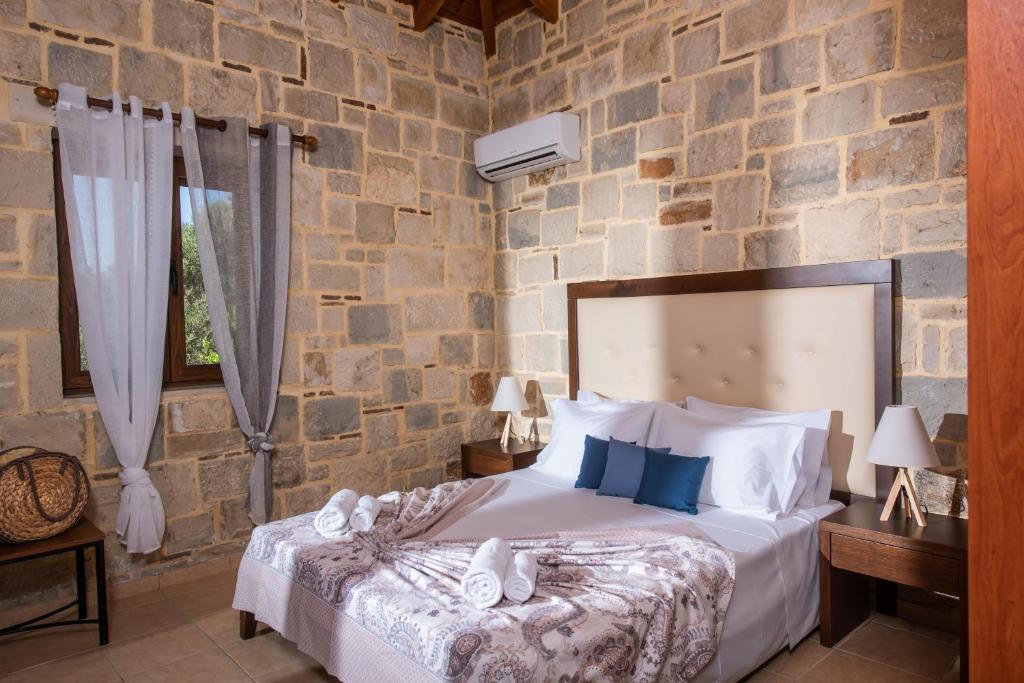Postel nebo postele na pokoji v ubytování Villa Elisavet