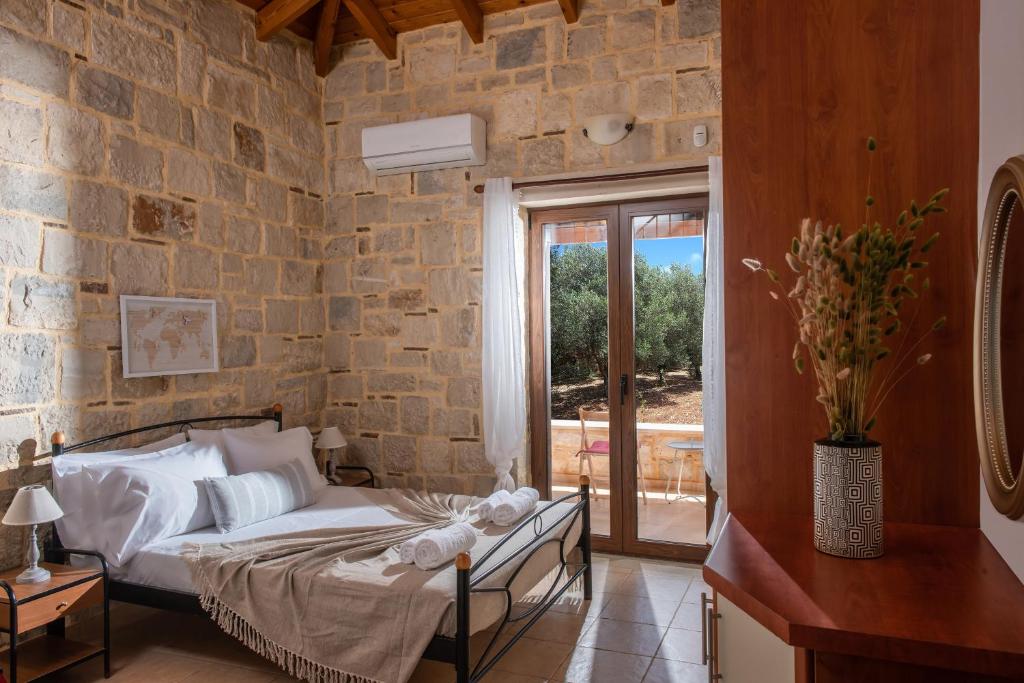 Postel nebo postele na pokoji v ubytování Villa Elisavet