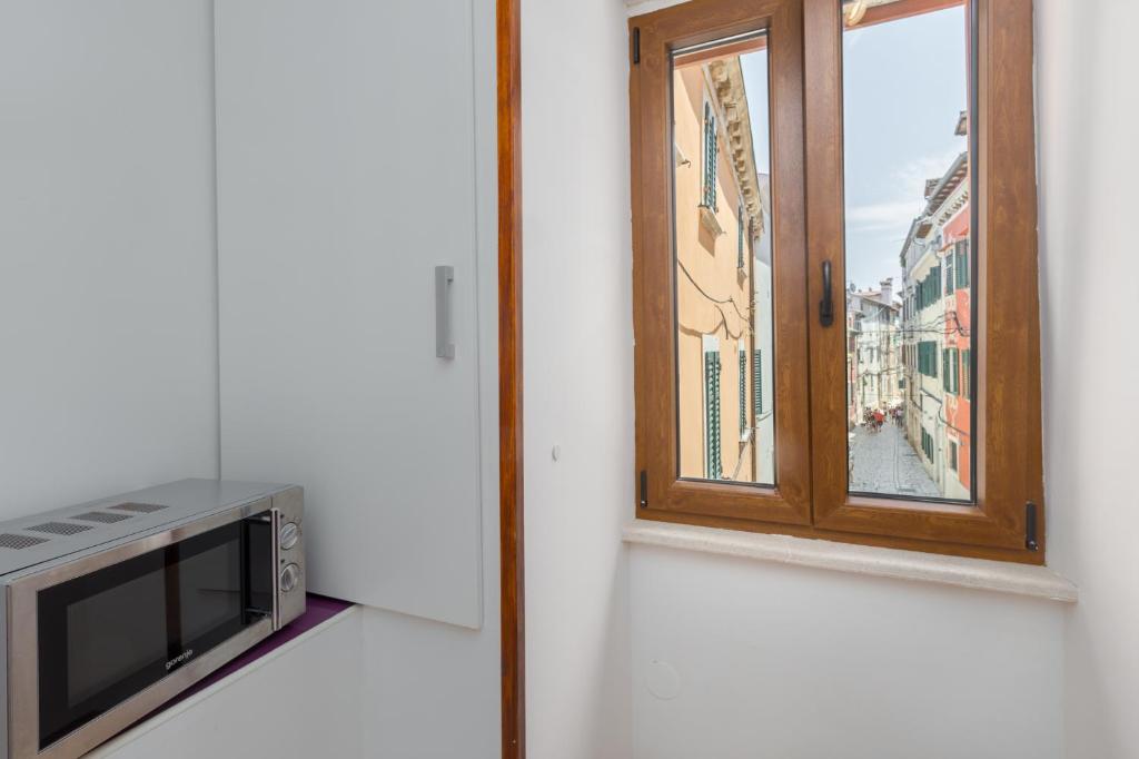 Kuchnia lub aneks kuchenny w obiekcie Apartment Lanterna Veneziana
