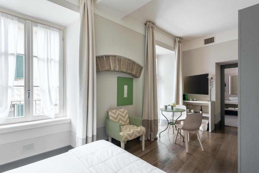TV a/nebo společenská místnost v ubytování GombitHotel
