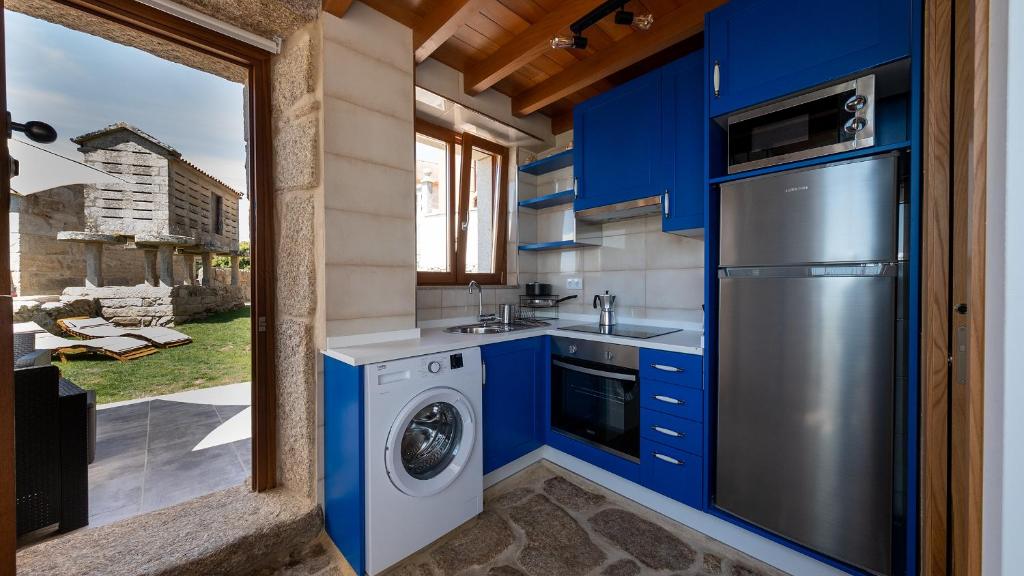 A kitchen or kitchenette at Suleiro Caldebarcos