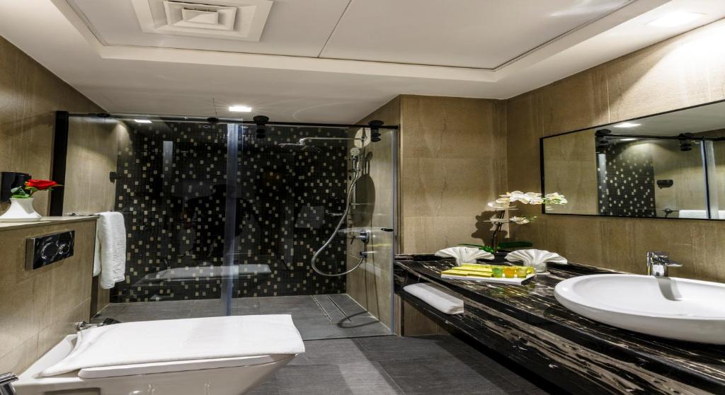 Koupelna v ubytování Rose Executive Hotel - DWTC