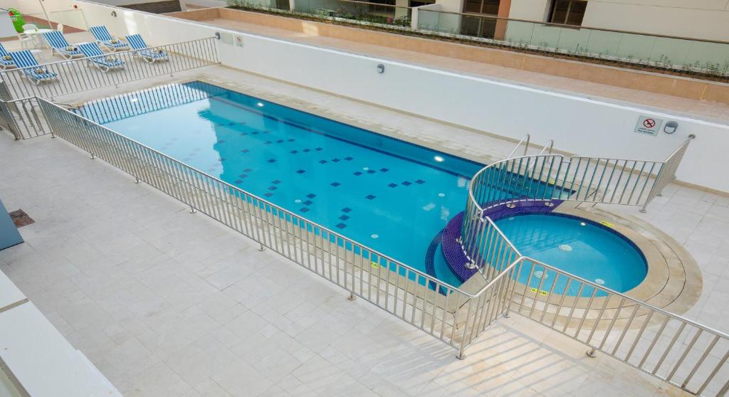 Bazén v ubytování Rose Executive Hotel - DWTC nebo v jeho okolí