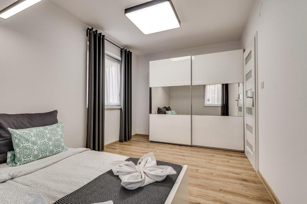 Kuchyňa alebo kuchynka v ubytovaní Zielone Apartamenty Katowice Chorzów
