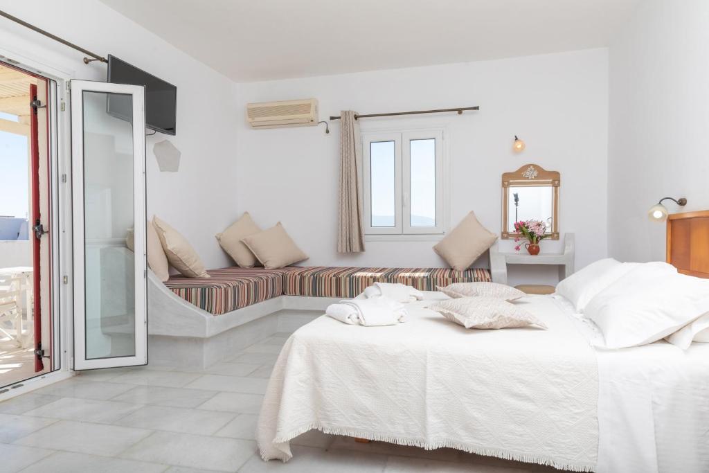 Posteľ alebo postele v izbe v ubytovaní Naxos Kalimera Apartments