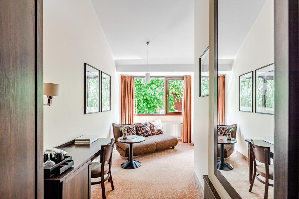 Svetainės erdvė apgyvendinimo įstaigoje Kerpė Hotel & SPA
