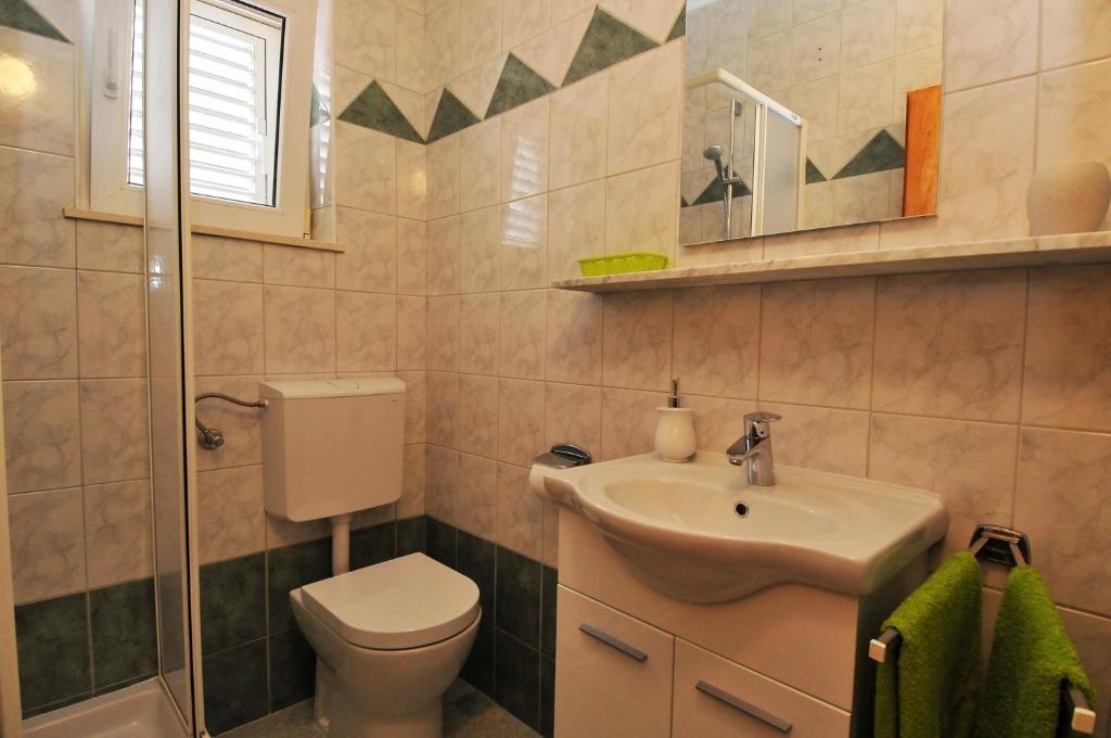 Kúpeľňa v ubytovaní Apartments Bugenvila