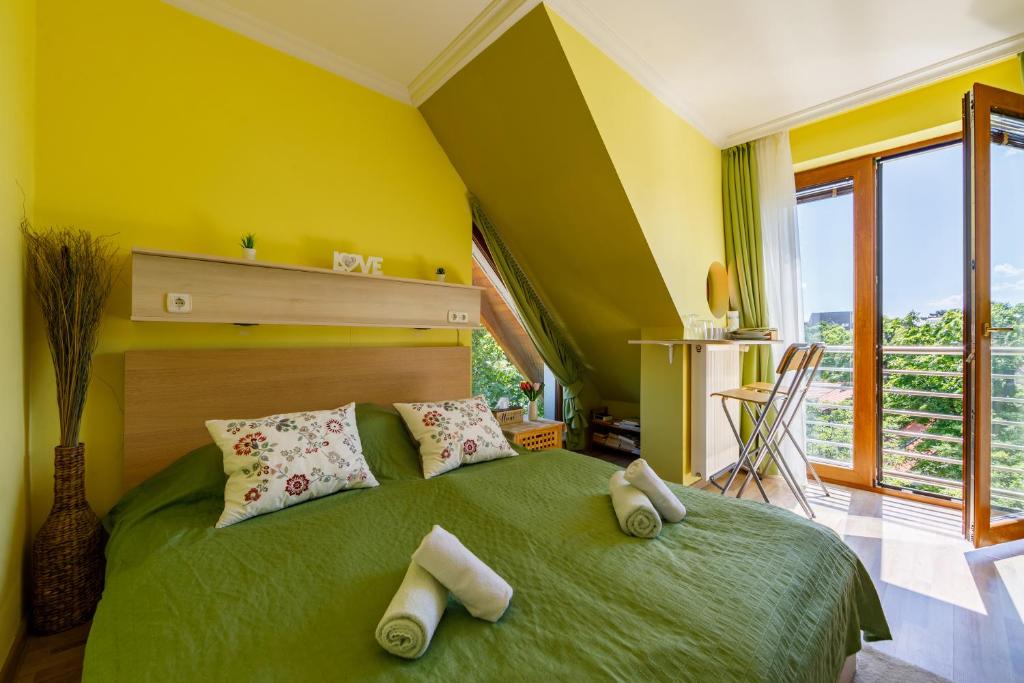 Posteľ alebo postele v izbe v ubytovaní Villa Muzsa Deluxe