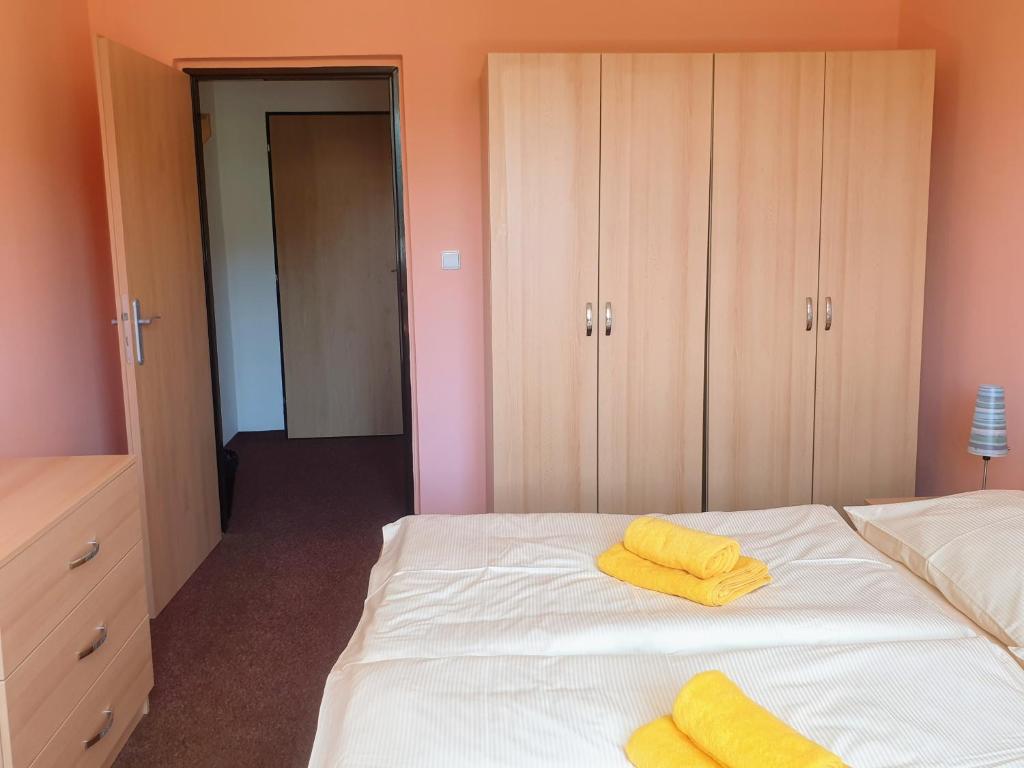 Postel nebo postele na pokoji v ubytování Penzion Lumis