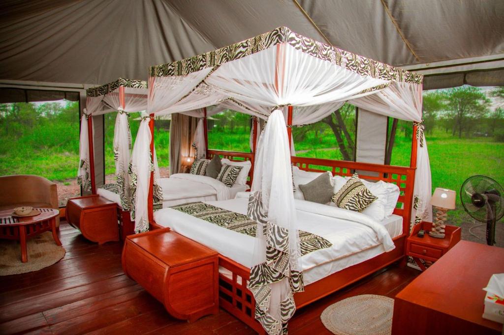 Booking.com: Tente de luxe Embalakai Authentic Camps , Serengeti, Tanzanie  . Réservez votre hôtel dès maintenant !