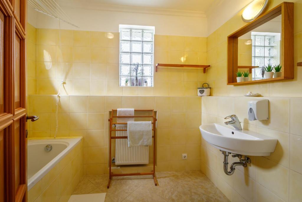 Kúpeľňa v ubytovaní Villa Muzsa Deluxe