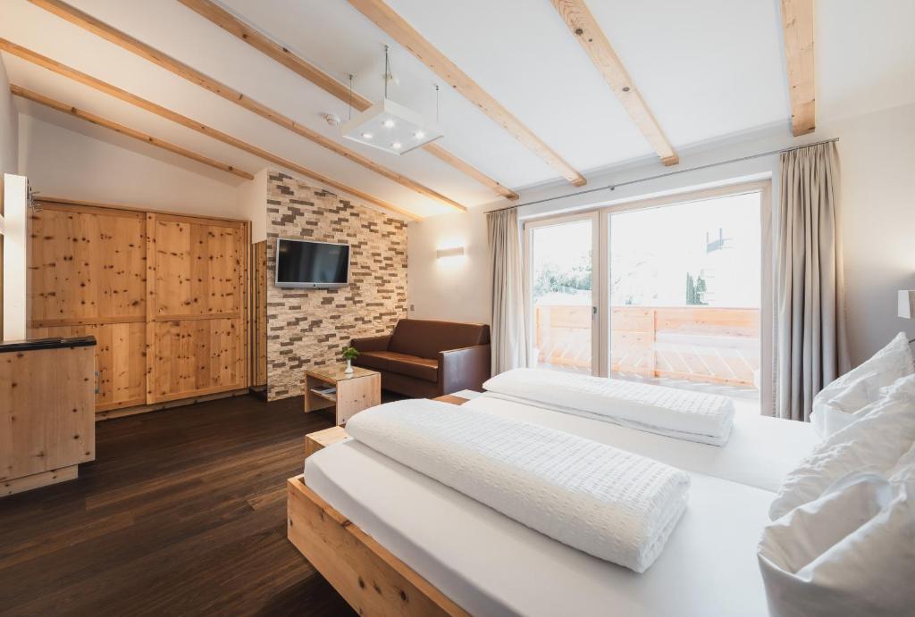 Postel nebo postele na pokoji v ubytování Hotel Bischofhof - Bistro Jasmin