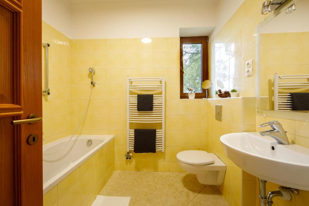Kúpeľňa v ubytovaní Villa Muzsa Deluxe