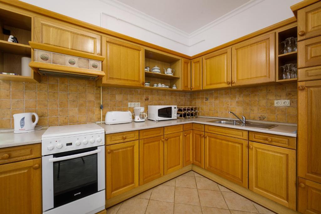 Kuchyňa alebo kuchynka v ubytovaní Villa Muzsa Deluxe