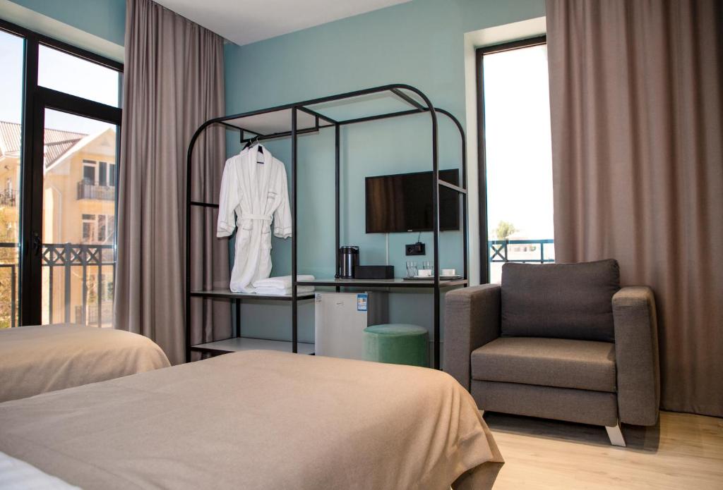 Postel nebo postele na pokoji v ubytování Maison